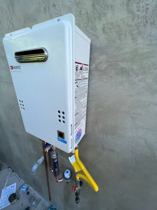 Tankless water heater installation for Lee Manor homes